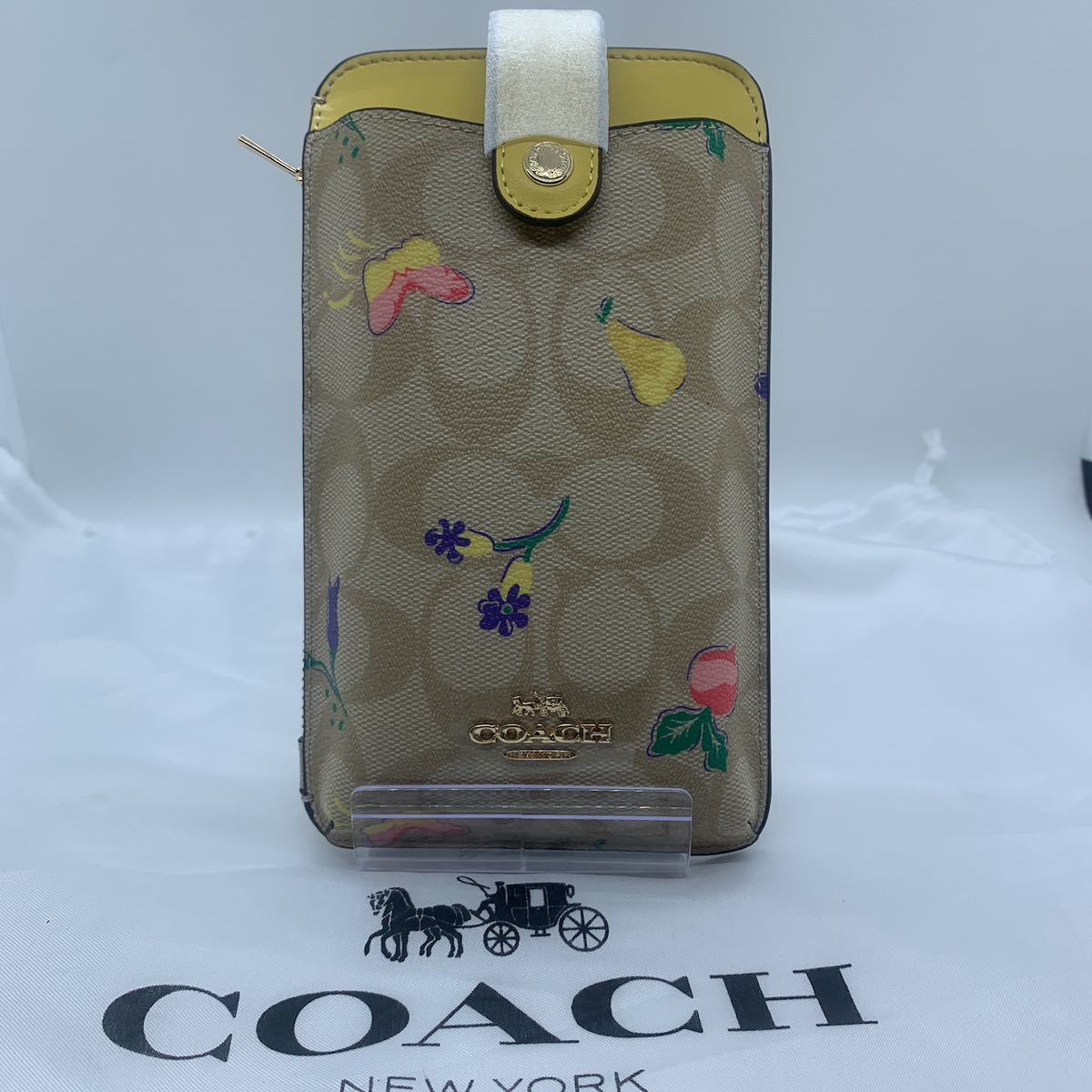 新品未使用　COACH スマホショルダー 大人気！！ スマホクロスボディ イエローおすすめ人スマホケースC8721_画像1