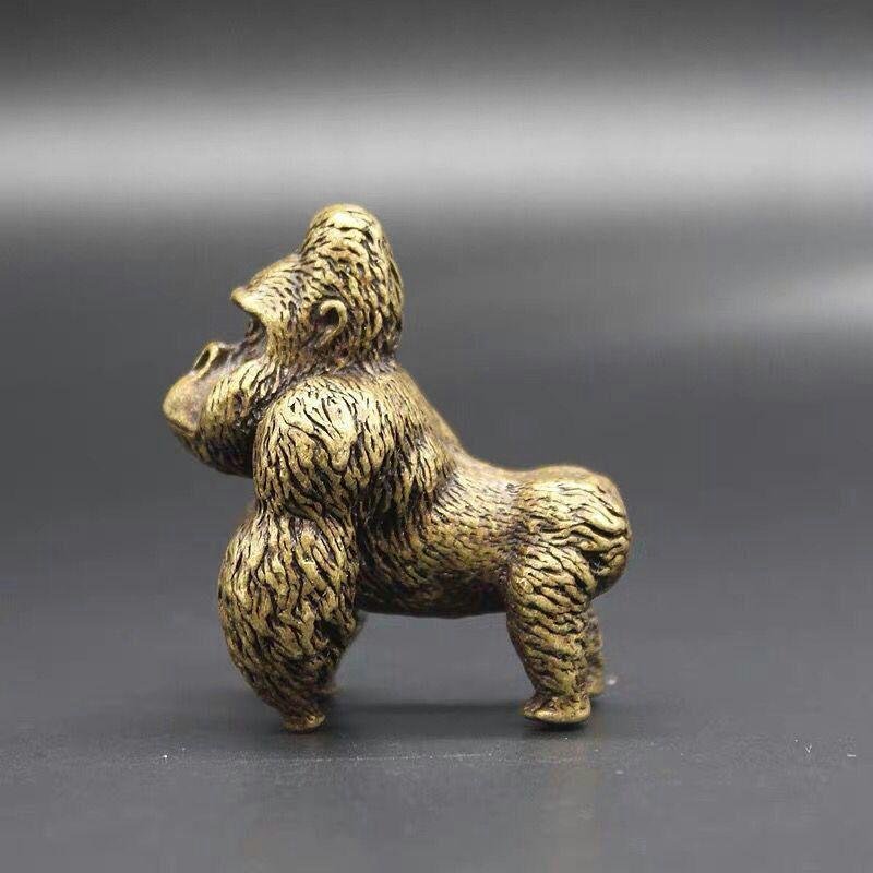 ゴリラの銅の芸の銅は猿の銅の手を愛します。j_画像5