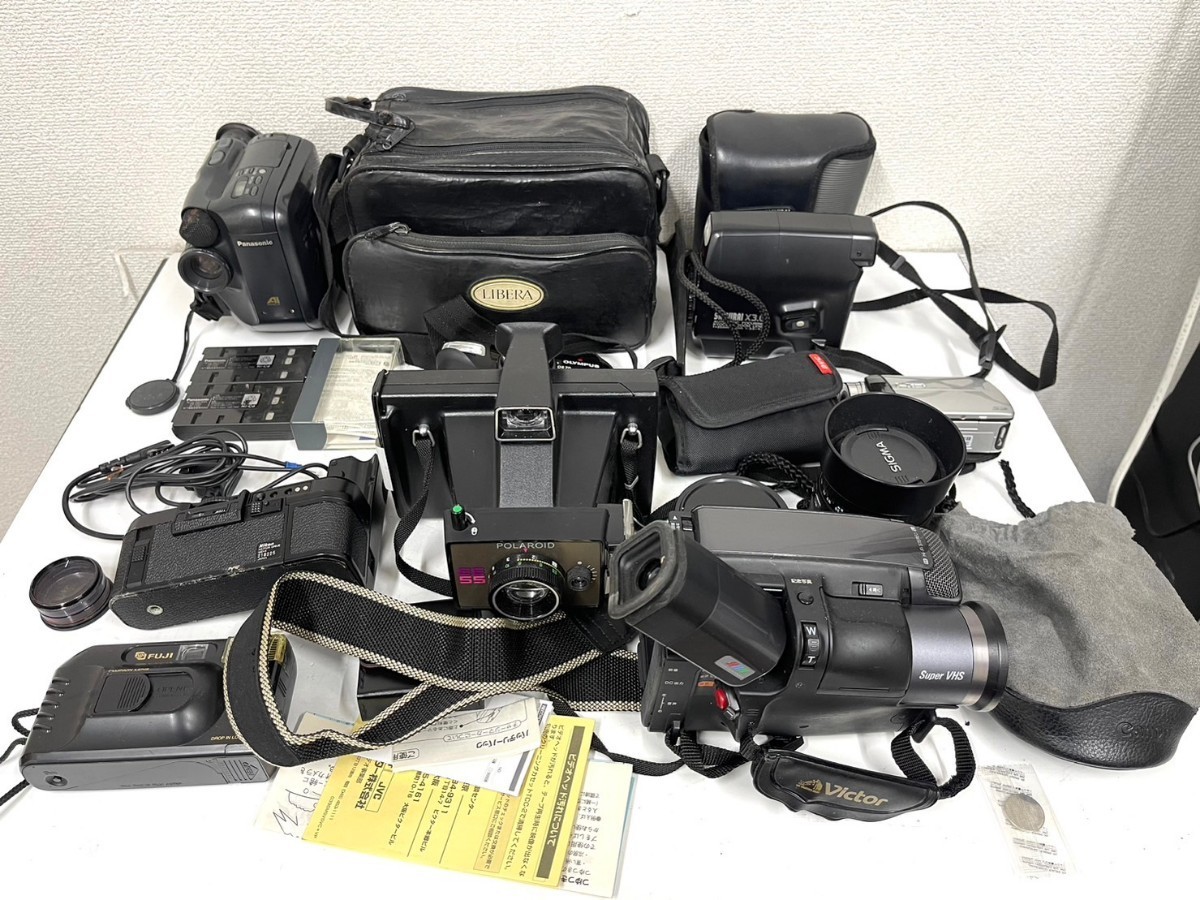 E997　カメラ　フィルムカメラ　ビデオカメラ　カメラレンズ　大量　まとめ売り　Pansonic　OLYMPUS　SAMURAI　Nikon　FUJI　Victor　他_画像1