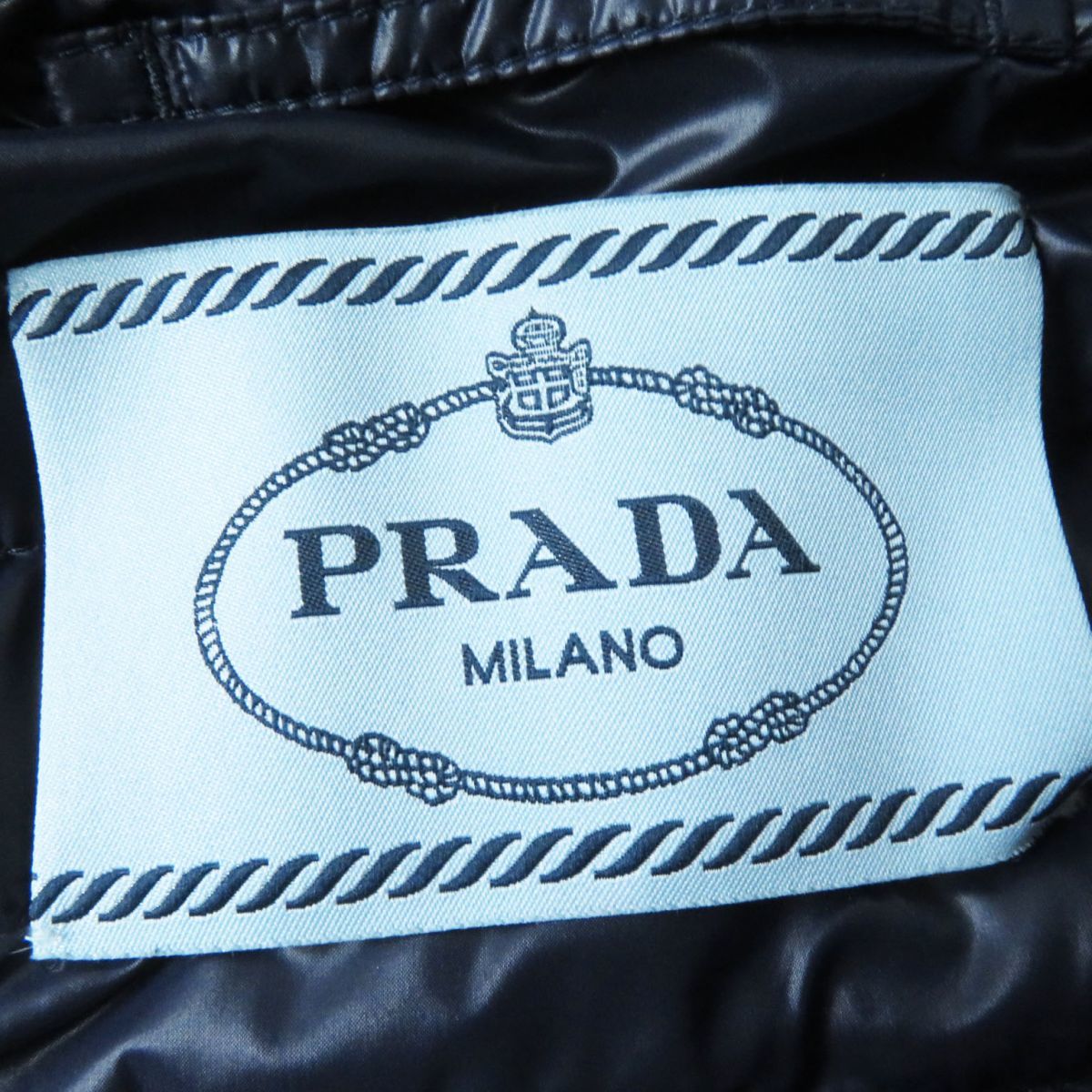  превосходный товар * стандартный товар 21 год PRADA Prada женский треугольник Logo | треугольник Logo plate пуховик черный | темно-синий 36