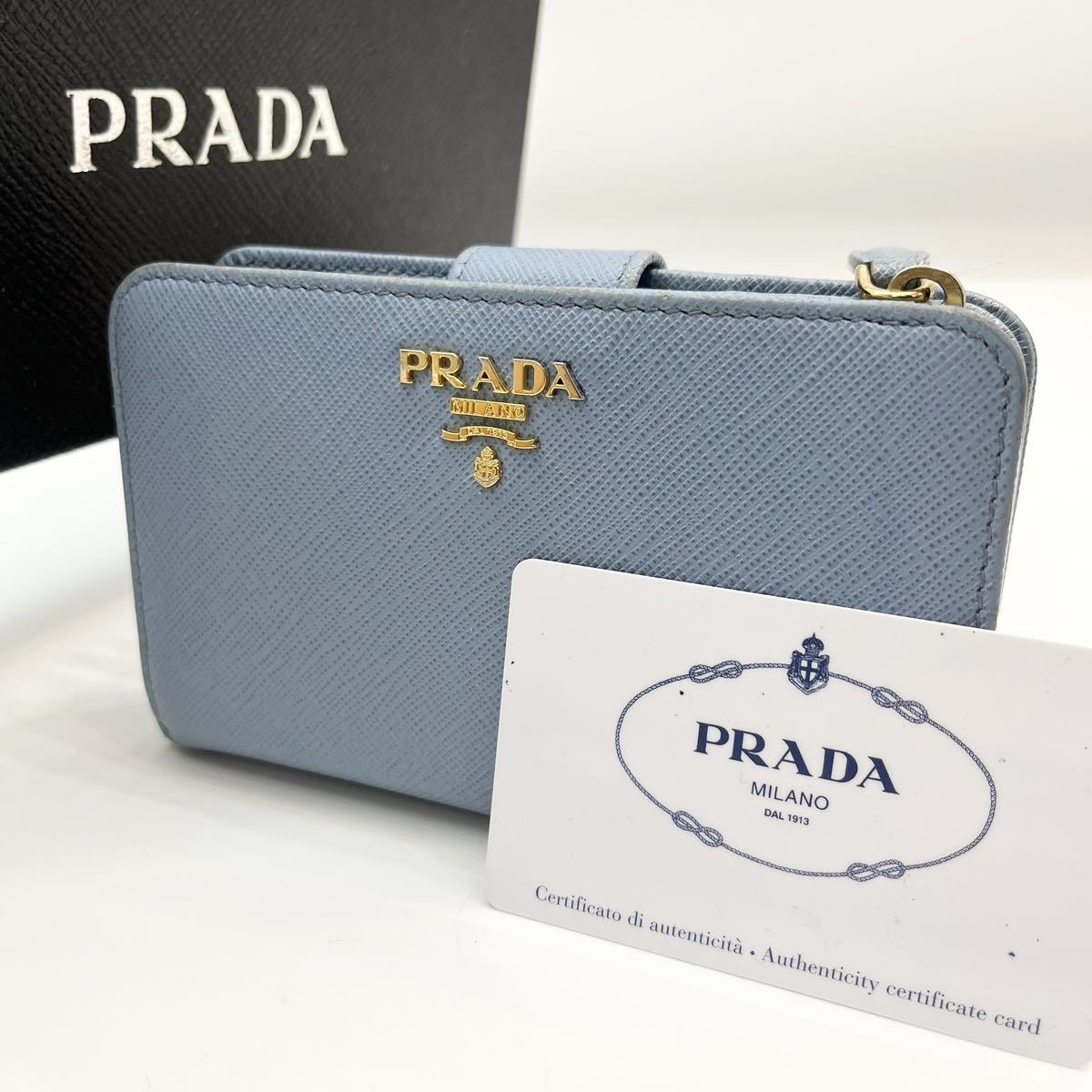 1円 美品 PRADA プラダ サフィアーノ レザー 二つ折り財布 財布 レディース ブルー 水色 現行デザイン メンズ レディース ユニセックス_画像1