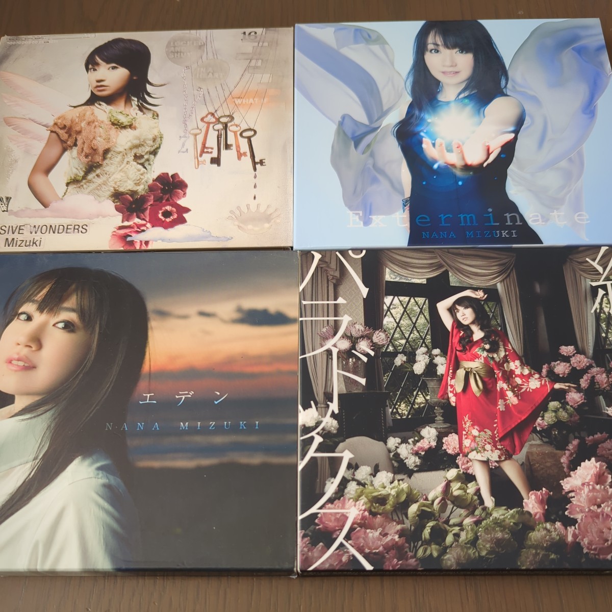 【送料込み】水樹奈々『MASSIVE WONDERS』『Exterminate』『エデン』『純潔パラドックス』4枚セット_画像1