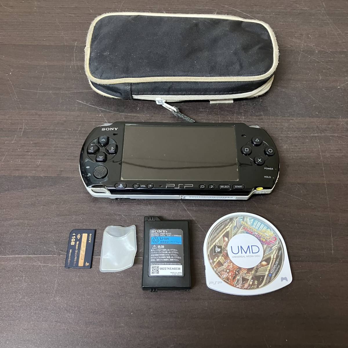 [12-87]PSP コントローラー 本体 PSP3000 黒 ブラック ソフト カセット ダンジョントラベラーズ2 ケース付き【宅急便コンパクト】_画像1