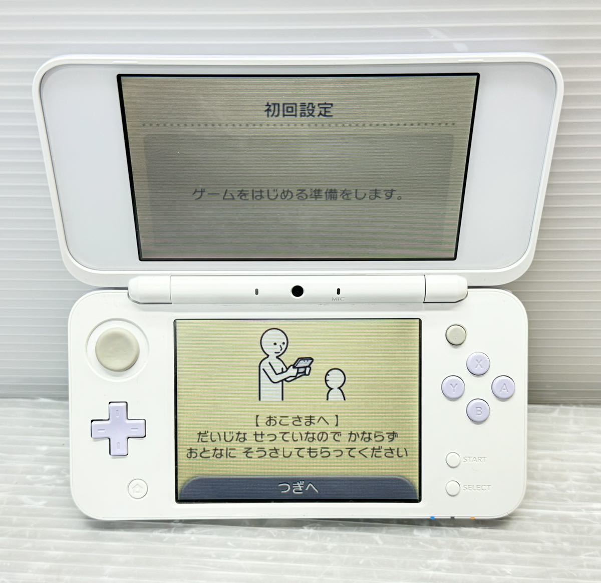 Nintendo newニンテンドー2DS LL (JAN-001) ホワイト×ラベンダー 本体のみ 初期化済み 純正ACアダプタ付き 中古動作確認済