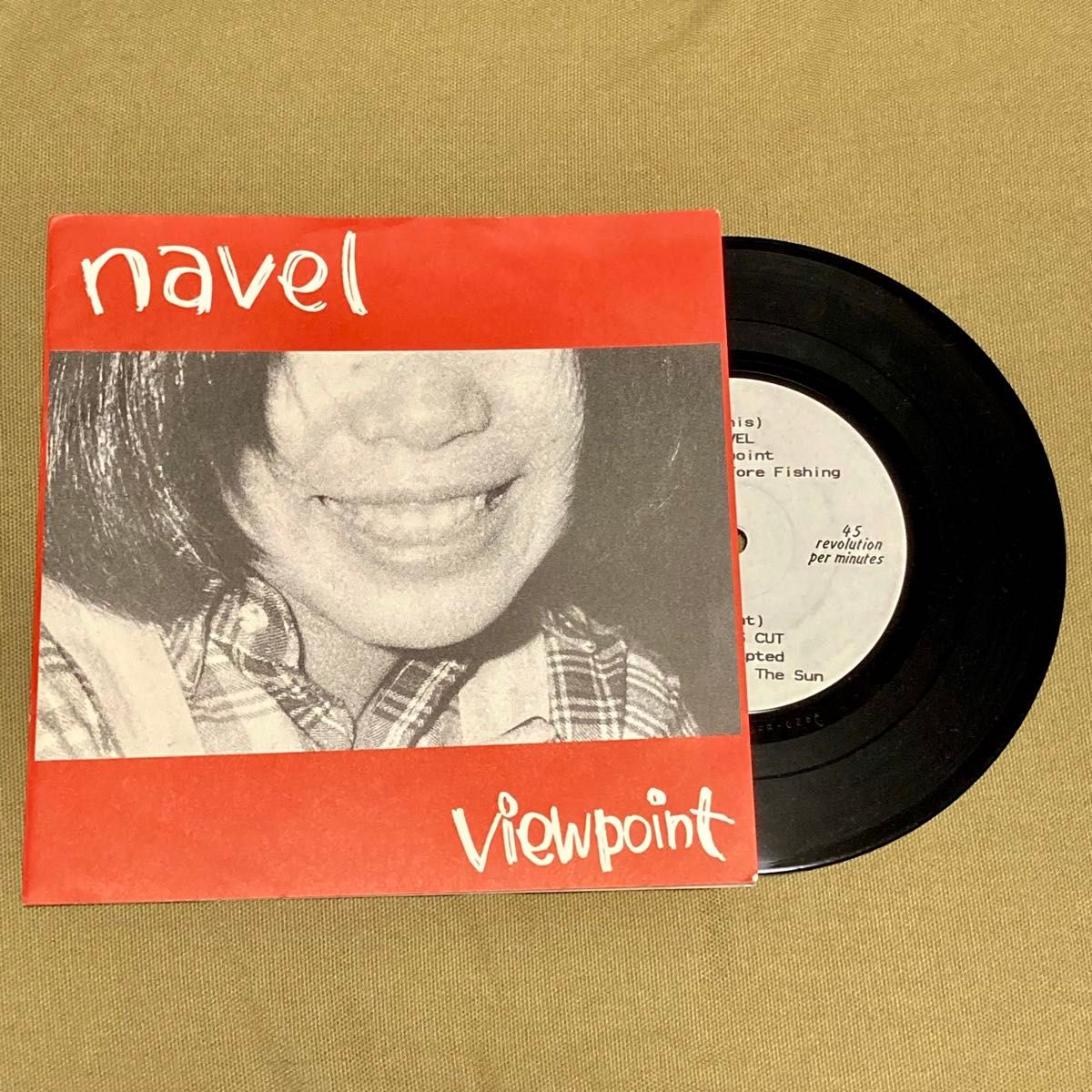 NAVEL/TRAVIS CUT split EP Snuffy Smile