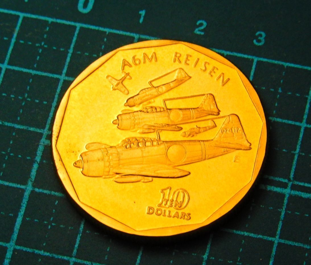 未使用 美品 偉大な航空機 飛行機 三菱重工業 日本海軍 A6M 零戦 零式艦上戦闘機 金鍍金ブラス製 記念硬貨 貨幣 US 10ドル コイン メダル_画像1