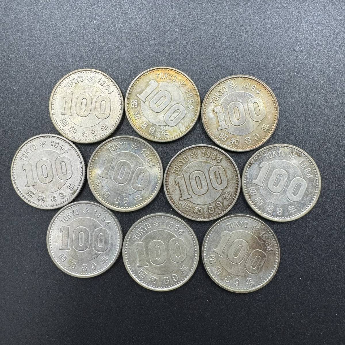 B012-129　日本古銭　１００円　１０枚　オリンピック_画像1