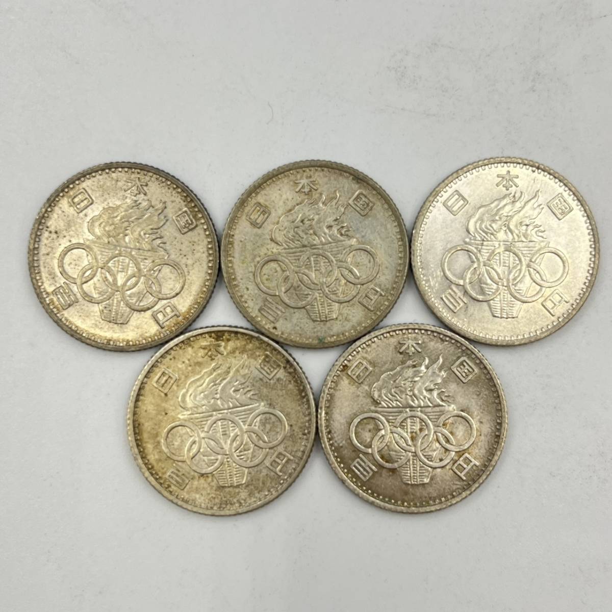 E012-635　日本古銭　１００円　１０枚　オリンピック_画像4