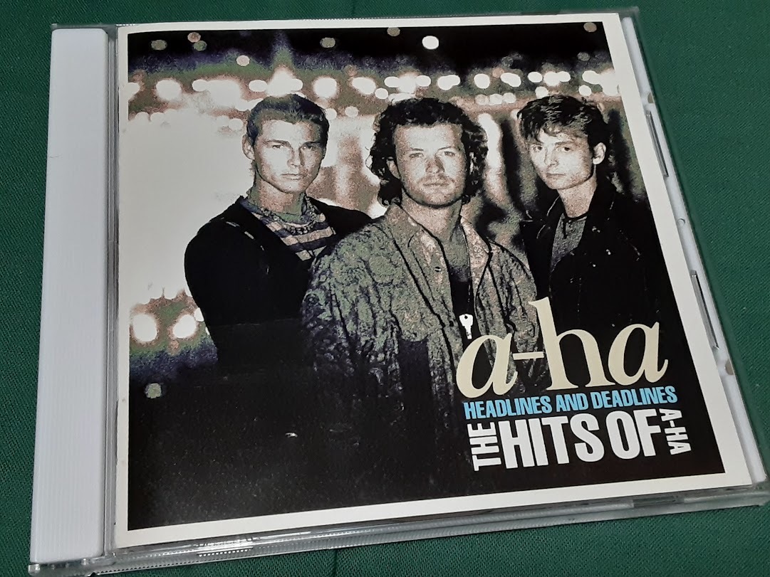 a-ha　アーハ◆『ヘッドラインズ＆デッドラインズ－ザ・ヒッツ・オブ・a-ha』日本盤CDユーズド品_画像1