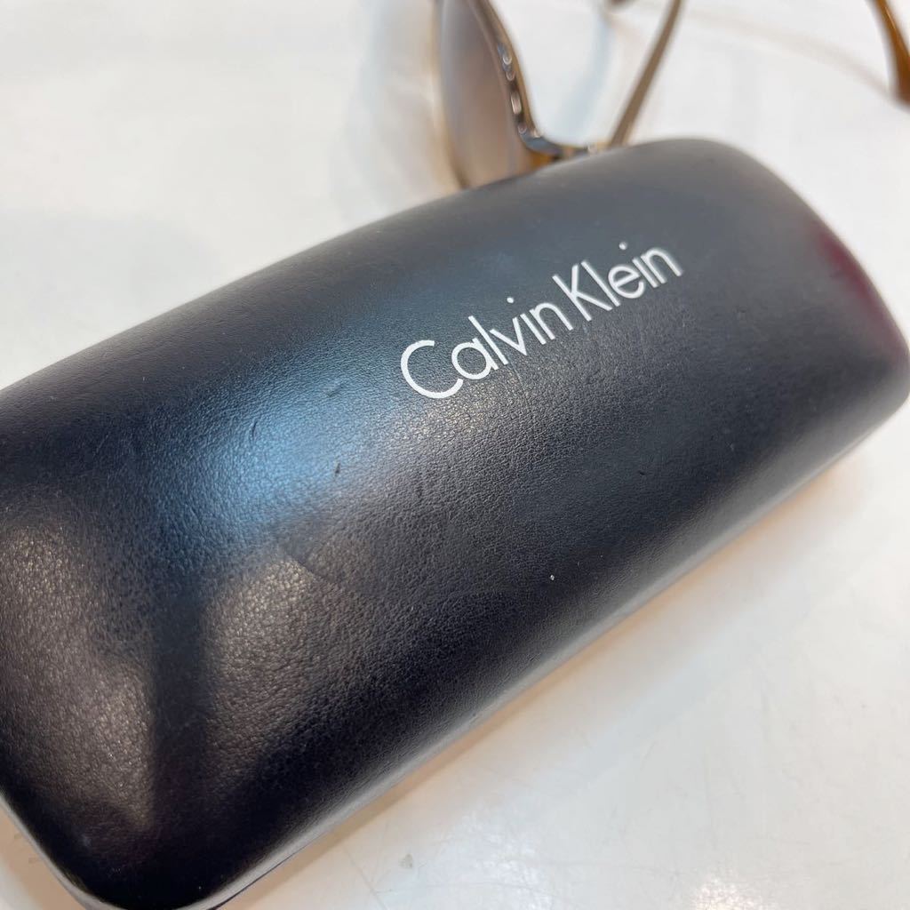  солнцезащитные очки Calvin Klein Brown женский 