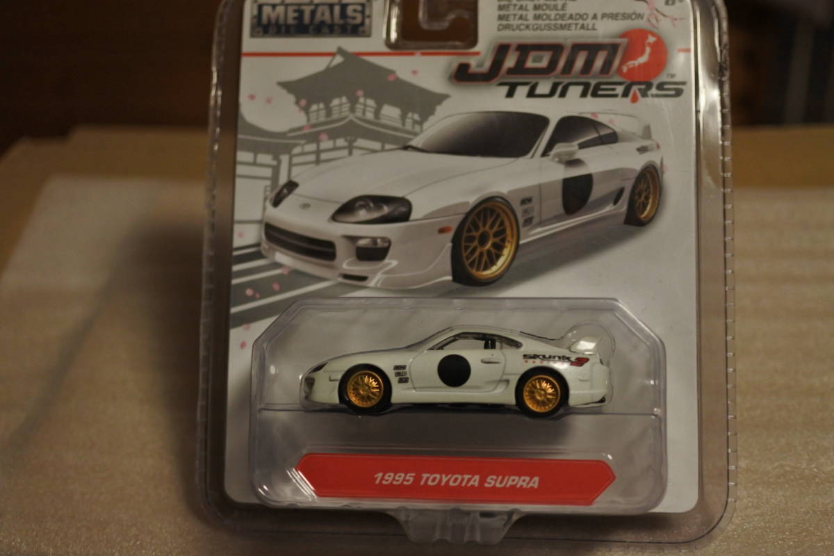 1/64　 JDM　TUNERS　1995　トヨタ　スープラ　SKUNK　レーシング2　パールホワイト　未使用未開封品_画像1