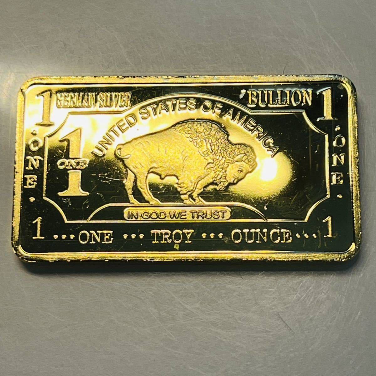 アメリカ　ブリオン　1トロイオンス　ブルデザイン　ケース付き　記念メタル　金色の塊　硬貨　重さ31.9g_画像1