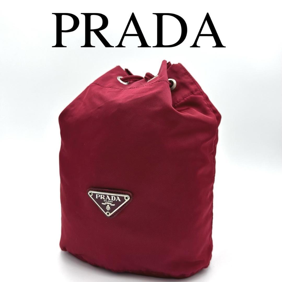PRADA プラダ ポーチ ミニバッグ 巾着 ロゴプレート ナイロン レッド系