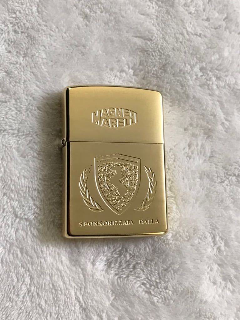 Zippo ジッポー ZIPPO オイルライター　FERRARI Magneti Marelli フェラーリ マニェーティ・マレッリ　未使用品　金色　ゴールド　1993年製_画像3