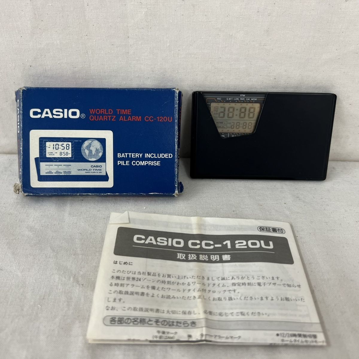 G211-H27-54◎ CASIO カシオ CC-120U ワールドタイム付きクロック 世界24ゾーン 動作未確認 約8.5cm×5.3cm_画像1