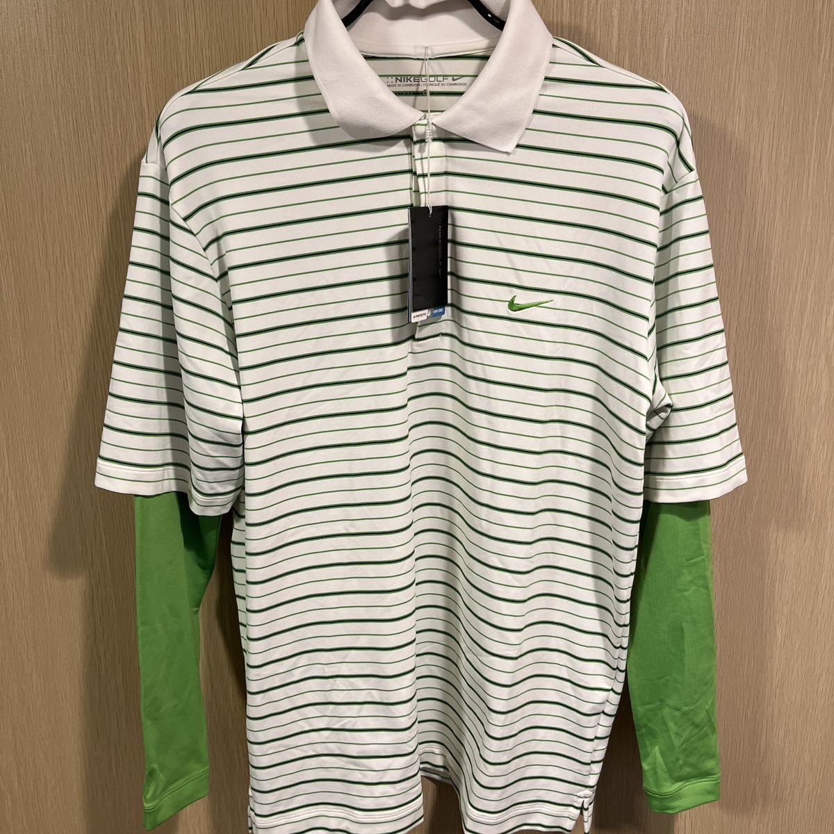 ◆新品未使用タグ付◆NIKEインナー一体型ゴルフシャツ　サイズM 定価9500円_画像1