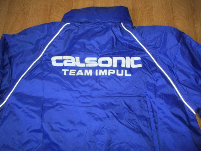 カルソニックレーシングチーム・スーパーGT　収納フード付き　防寒ジャケット　Lサイズ　極美中古_画像1
