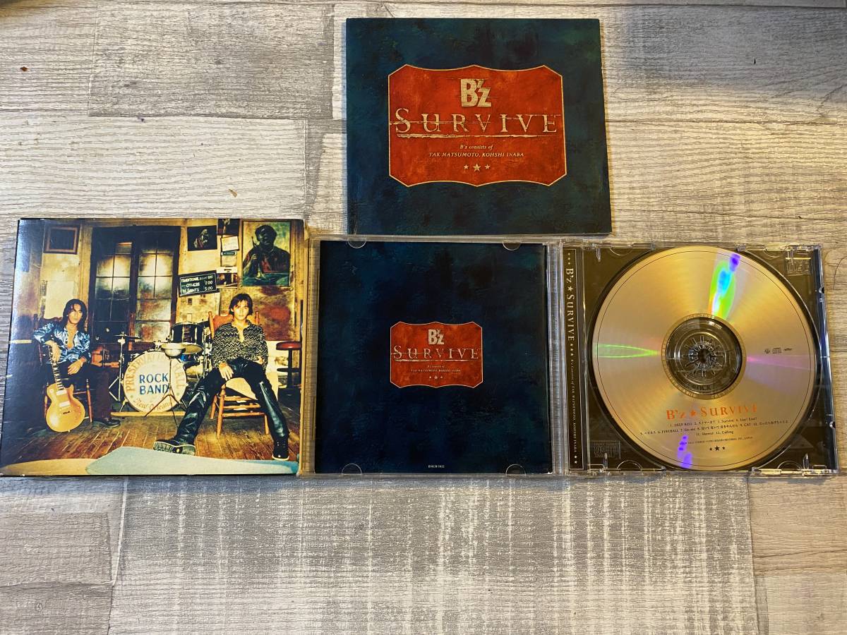 超希少！！入手困難！！CD B'z『SURVIVE』曲名は、画像4,5参照 他 松本孝弘(g) 泣いて泣いて泣きやんだら/Calling 他 DISC1 全12曲_画像3