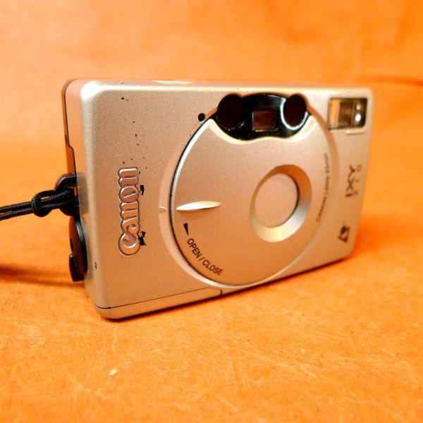l219 Canon IXY210 コンパクトカメラ シャッター・フラッシュOK サイズ:幅約8.3cm 高さ約5.5cm 奥行約3.5cm/60の画像1