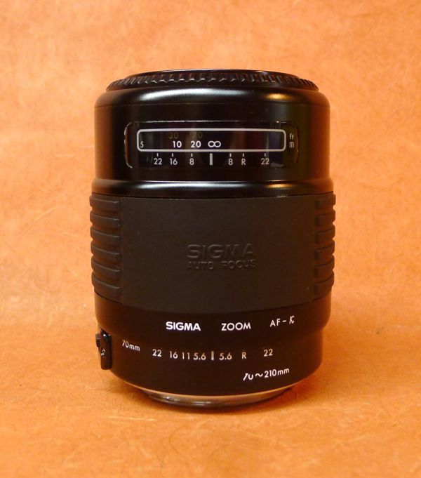 l293 SIGMA ZOOM-K 1:4~5.6 f=70~210 lens auto focus size : approximately diameter 7× height 10.5cm /60