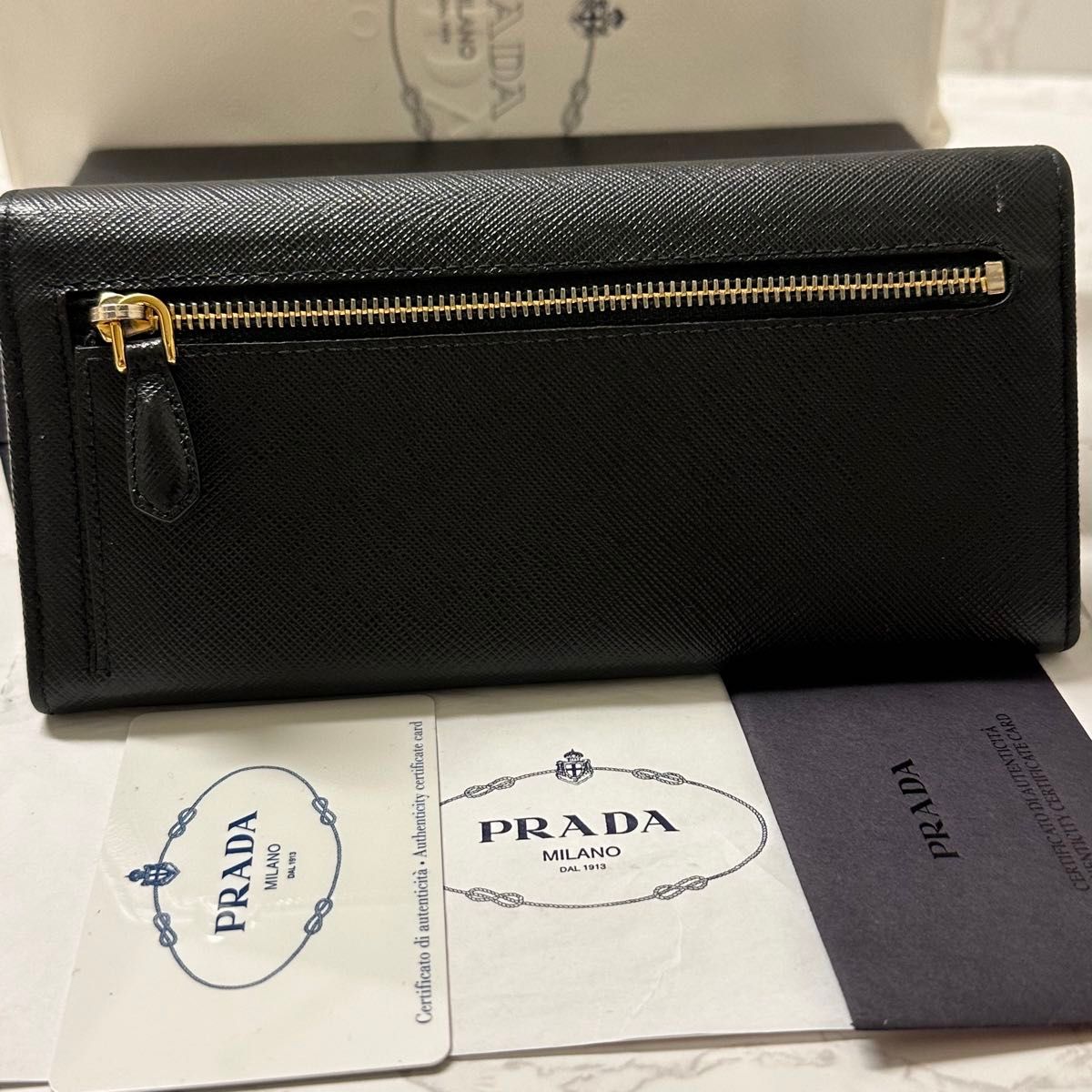 新品同様！ プラダ PRADA 財布 長財布 サフィアーノ リボン