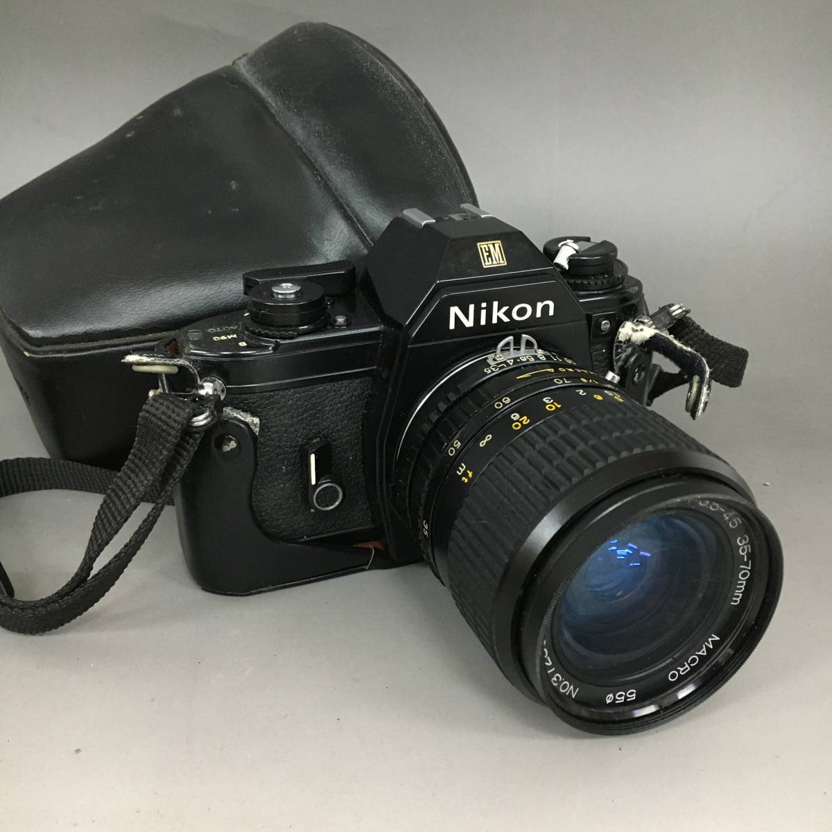 BF9/66　Nikon ニコン EM フィルムカメラ 一眼レフ OSAWA MC 1:3.5-4.5 35-70mm フェイクレザーケース付き 中古品 ○_画像1