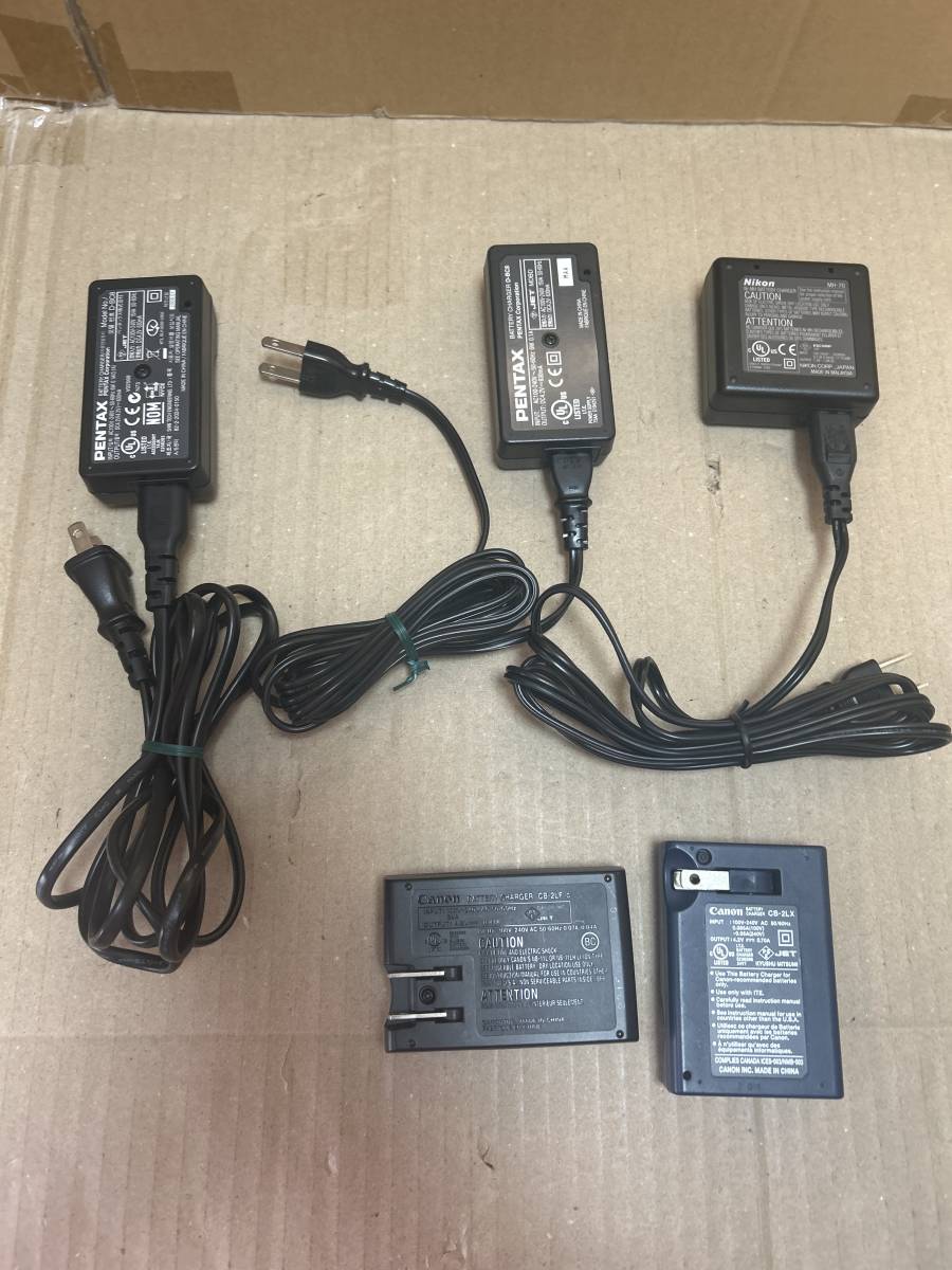 Canon.CB-2LF,Canon.CB-2LX,PENTAX.D-BC8(2 piece ) battery charger,Niko.MH-70. battery shape charger, explanation . please see 