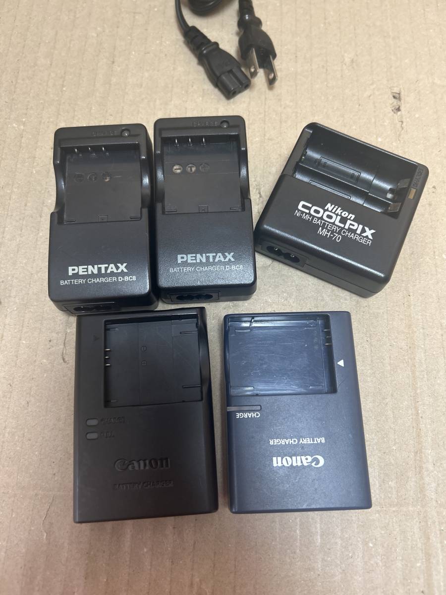 Canon.CB-2LF,Canon.CB-2LX,PENTAX.D-BC8(2 piece ) battery charger,Niko.MH-70. battery shape charger, explanation . please see 