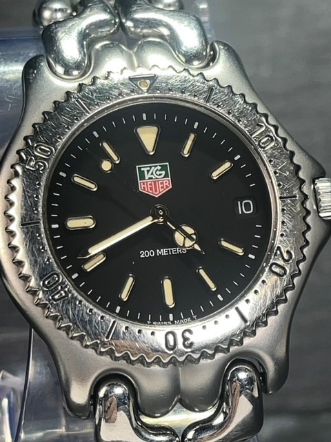 美品 TAG HEUER タグホイヤー PROFESSIONAL プロフェッショナル 200M セル S99.306 M25007 QZ 黒文字盤 メンズ 腕時計 動作確認済み_画像1