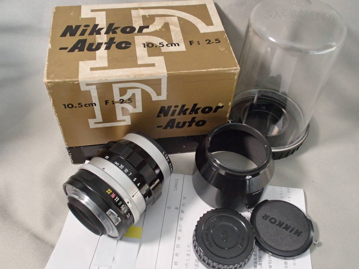 ニコン/Nikon 「NIKKOR-P Auto 1:2.5 f=10.5cm Nipon Kogaku Japan」非Ai　フード・ プラケース・元箱（レンズのS/Nと同一）付き_画像1