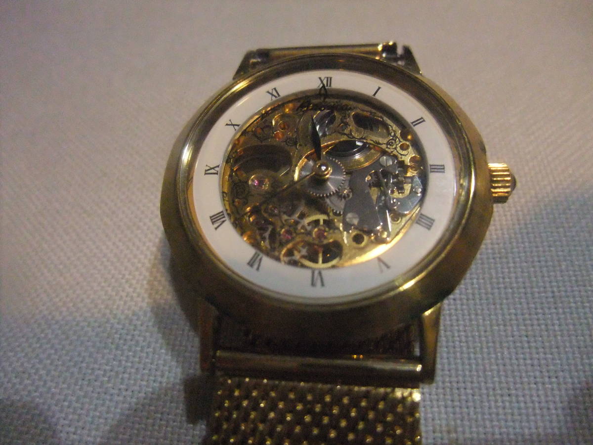 【中古・長期保管品】スイス製高級腕時計◎　アロマ　AROMA　両面スケルトン腕時計☆手巻き★ゴールドベルトは新品です☆正確な稼働品です_スケルトン。歯車等の動きが克明に判ります