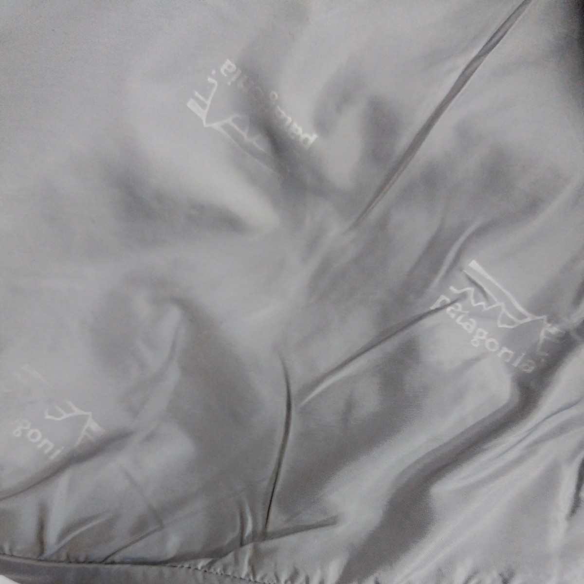 パタゴニア　ウールジャケット_裏側の袖にプリントのマーク。