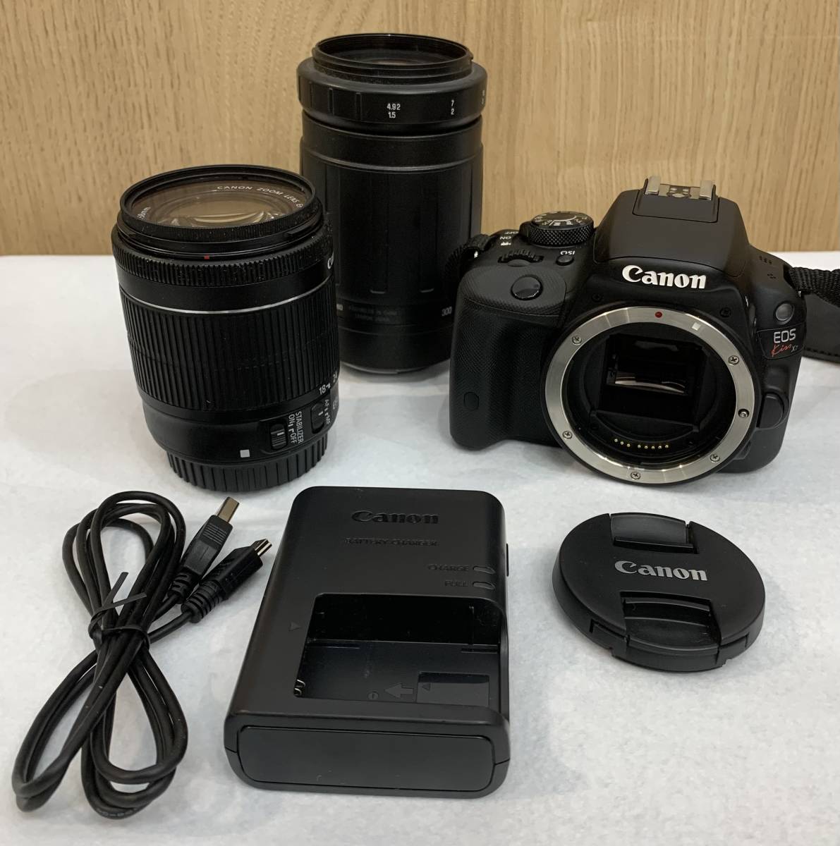 1円〜Canon キャノン EOSKiss X7 TAMRON 100-300 1:5-6.3 EF-S 18-55 1:3.5-5.6 IS STM 一眼デジタルカメラ レンズ付 通電確認_画像1