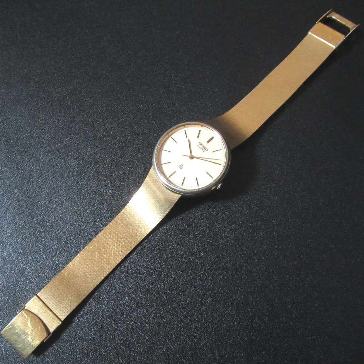 ジャンク品 SEIKO セイコー DOLCE ドルチェ クォーツ 3針式 メンズウォッチ 腕時計 9641-7000 ゴールドベルト×シルバー文字盤の画像6