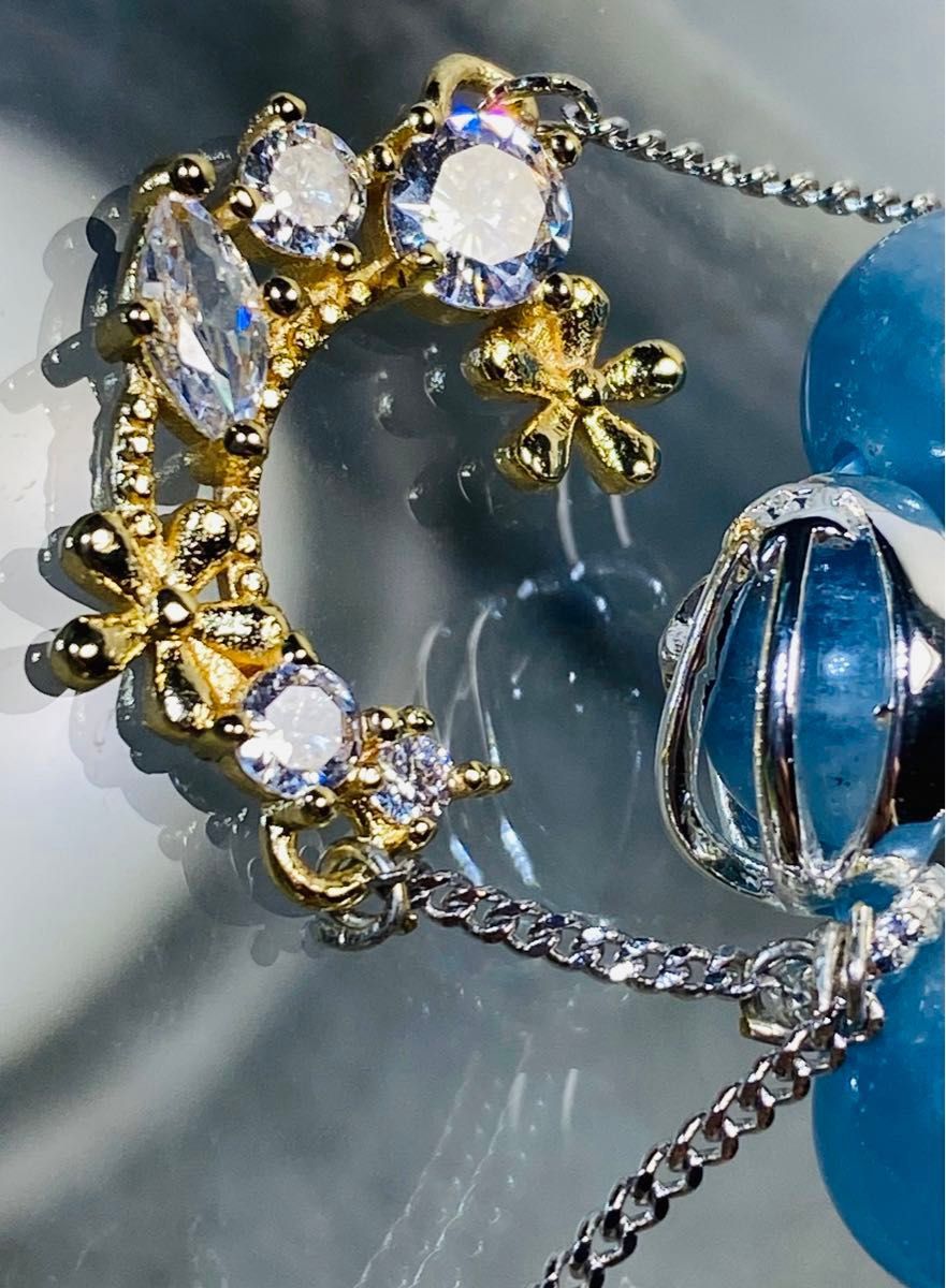 TZ278ブルーオニキスアイリス水晶、シルバーオブシディアンの天使デザインブレスレット。月とクラック水晶のチャーム飾り