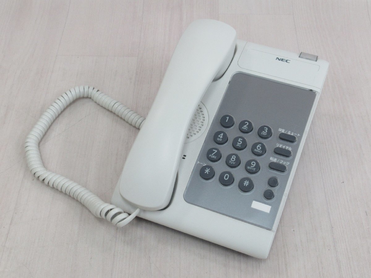 ▲ΩZZC 1264 o 保証有 DTL-1-1D(WH)TEL NEC DT210 標準電話機 金具付き 綺麗目・祝10000！取引突破！_画像1