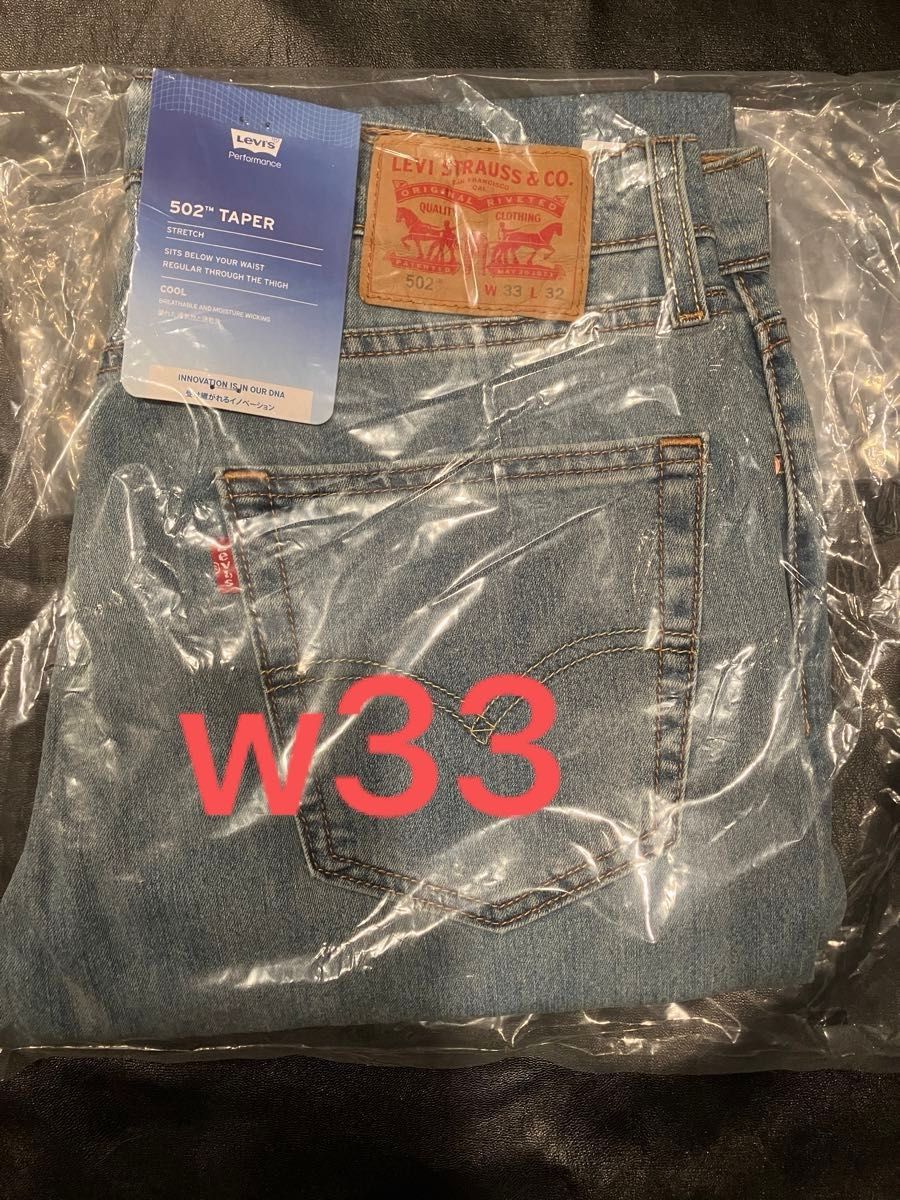 LEVIS PERFORMANCE COOL 502 テーパードジーンズ ミディアムインディゴ WORN IN W33 