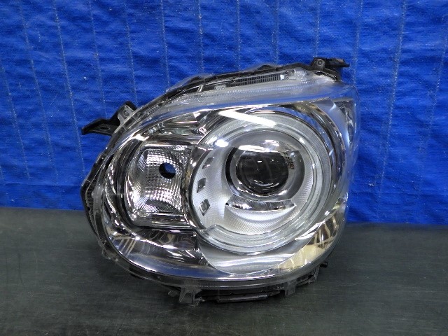 6323　ムーヴキャンバス　LA800S　LA810S　左ライト　LED　100-69038　8L　良品_画像1