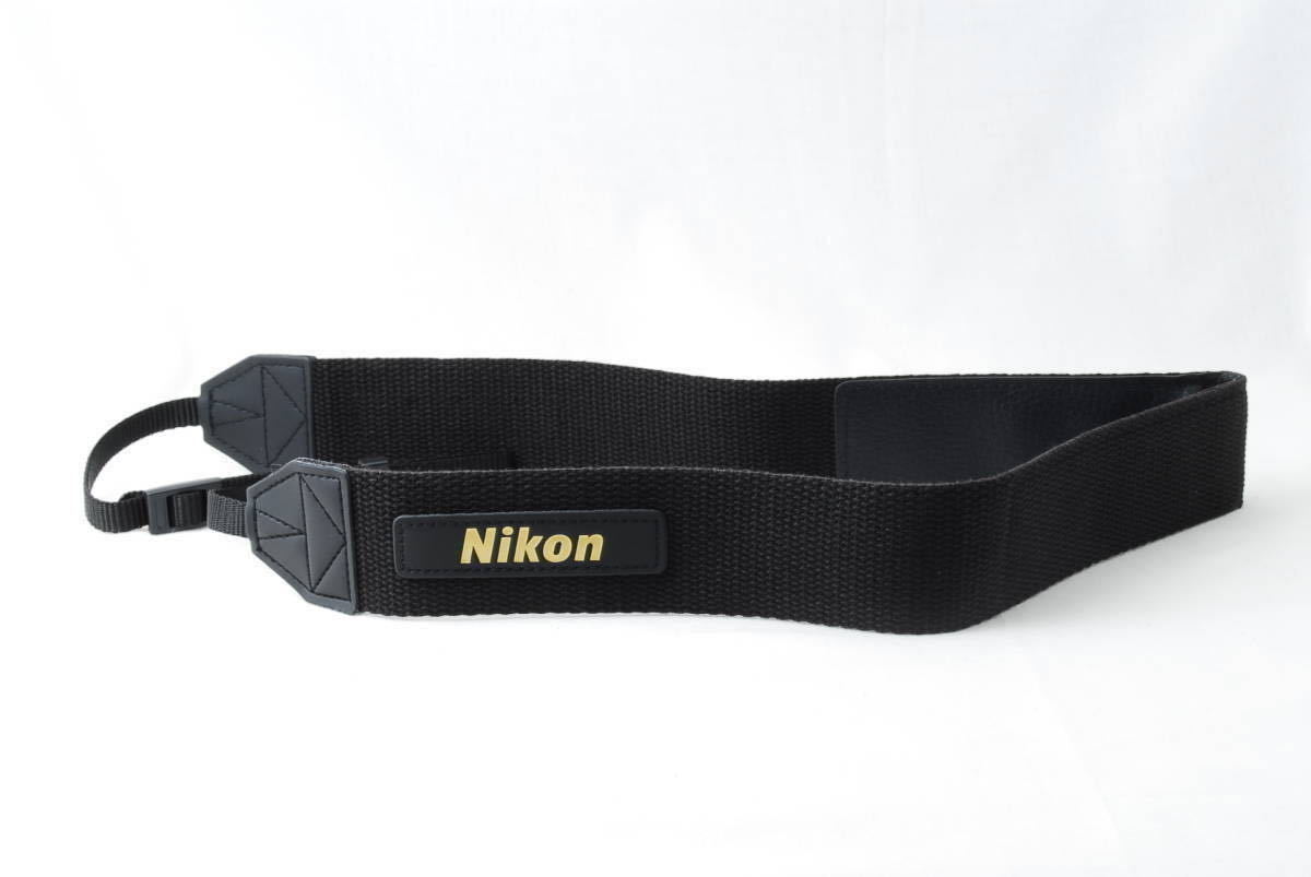 * new goods * unused *Nikon Nikon original camera strap black color ( black )× gold color ( Gold ) digital single-lens film camera camera strap*