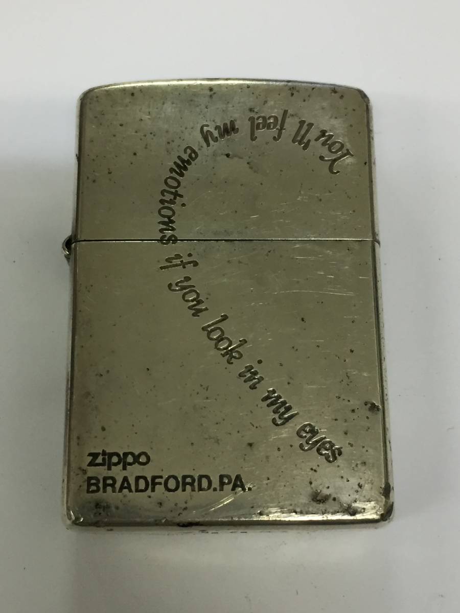 1円～！ZIPPO ジッポ ライター You'll feel my emotions if you look in my eyes 私の瞳に愛を感じて シルバー 2005年 喫煙具 着火確認済み_画像1