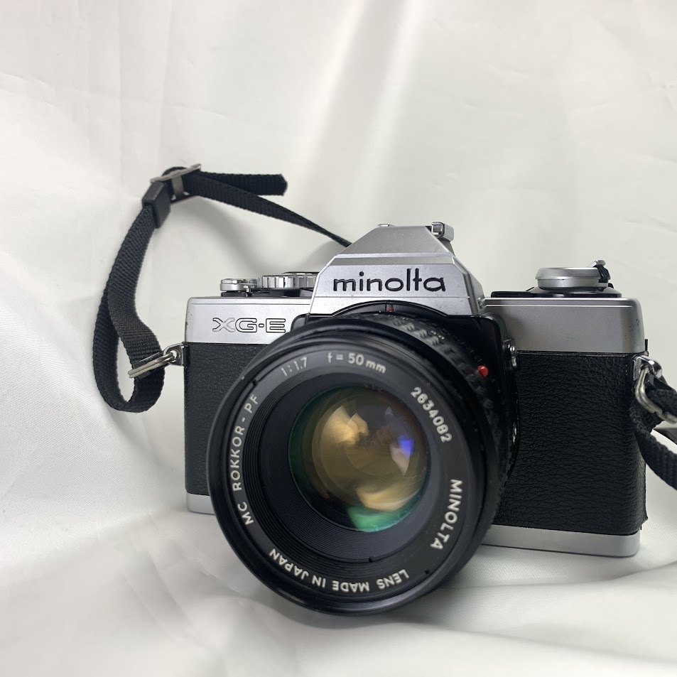 ミノルタ MINOLTA XG-E カメラとMC ROKKOR -PF 1：7 f=50mm レンズ 簡易清掃【ジャンク】_画像1
