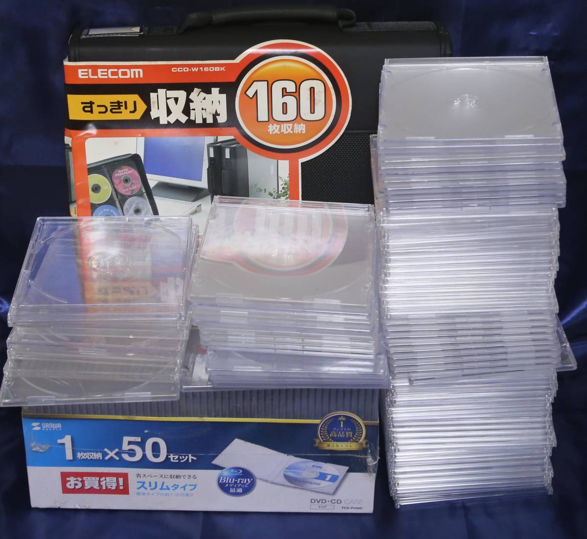 ■SANWA SUPPLY DVD・CDケース スリムタイプ 50枚 + 77枚 + 7mm厚 6枚. 計133枚 ELECOM CD・DVD WALLET おまけ 長期保管品 送料込み_画像1