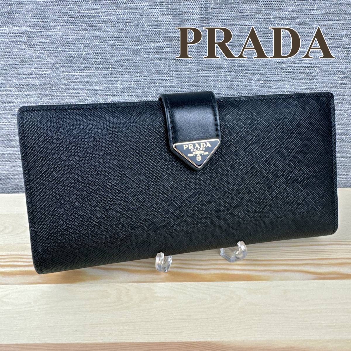 プラダ PRADA 二つ折り長財布 三角プレート ブラック 1MV025
