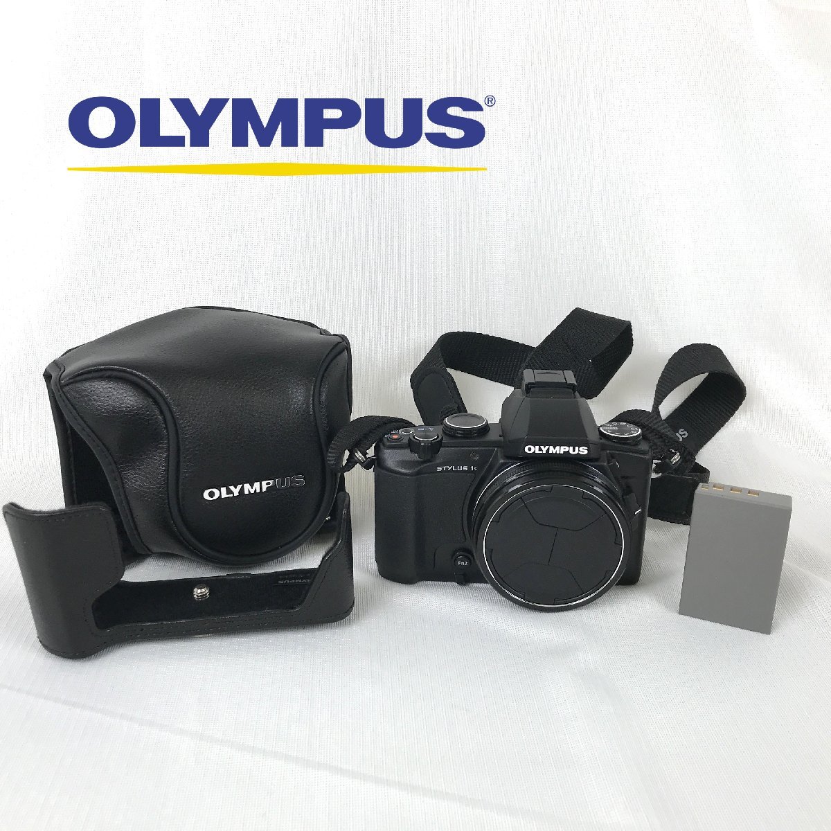 1201【ジャンク】 OLYMPUS オリンパス STYLUS 1s コンパクトデジタルカメラ / i.ZUIKO DIGITAL 10.7×WIDE OPTICAL ZOOM 6-64.3mm 1:2.8_画像1