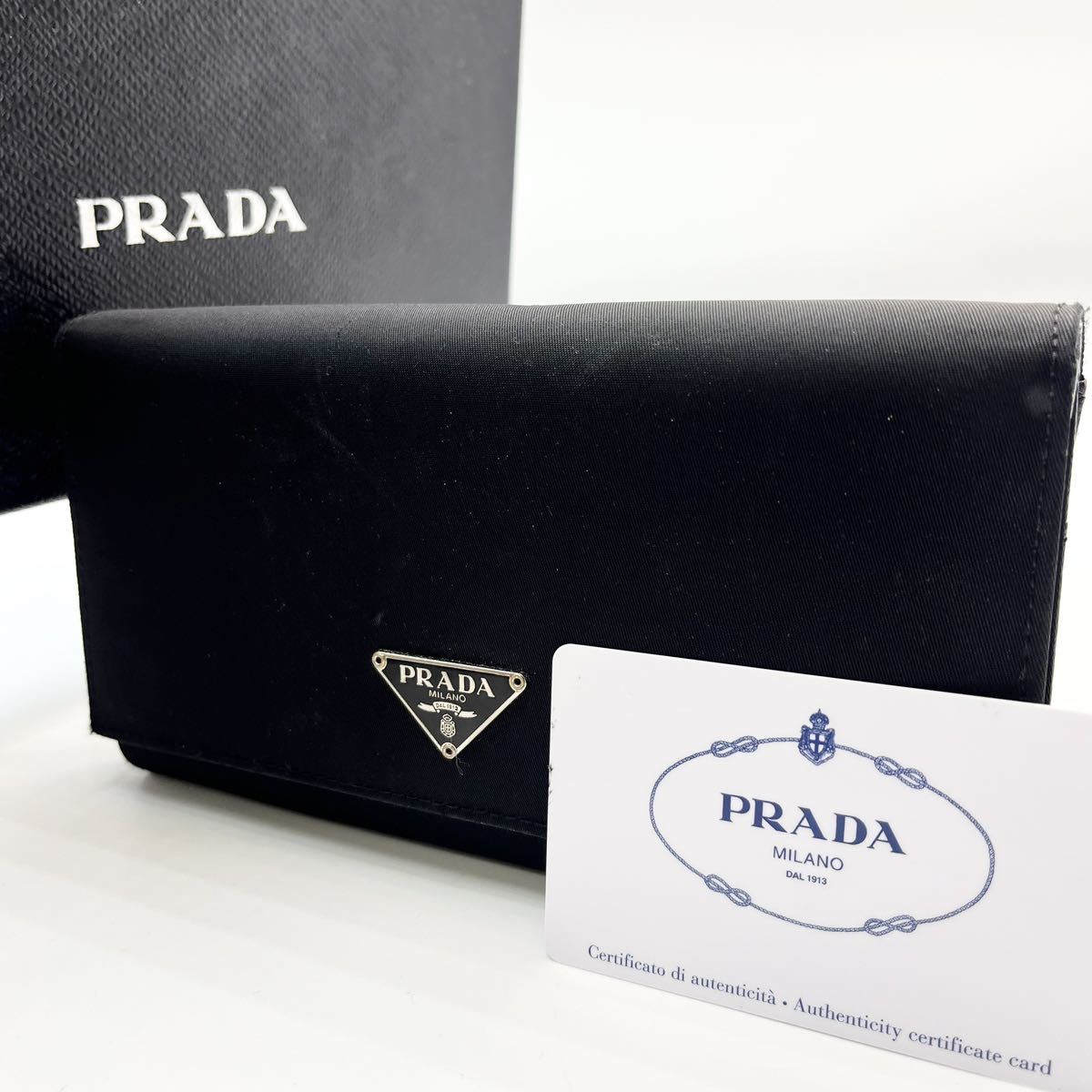 1円【美品】 PRADA トライアングルロゴ 長財布 オーガナイザー テスートナイロン メンズ 三角ロゴ 折り財布 ホック式 正規品 高級感_画像1