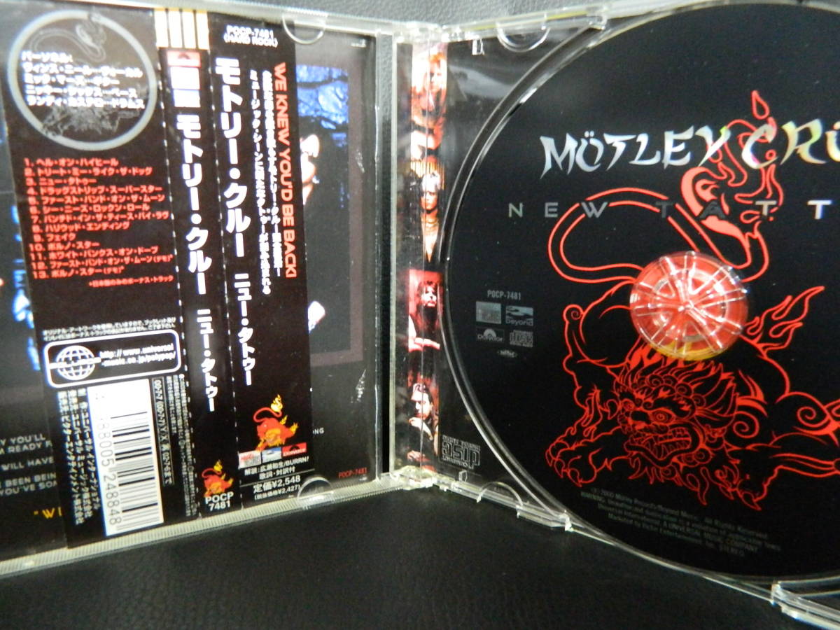 (17)　 MOTLEY CRUE　　/　　NEW TATOO　　 日本盤　 　ジャケ、日本語解説 経年の汚れあり_画像2