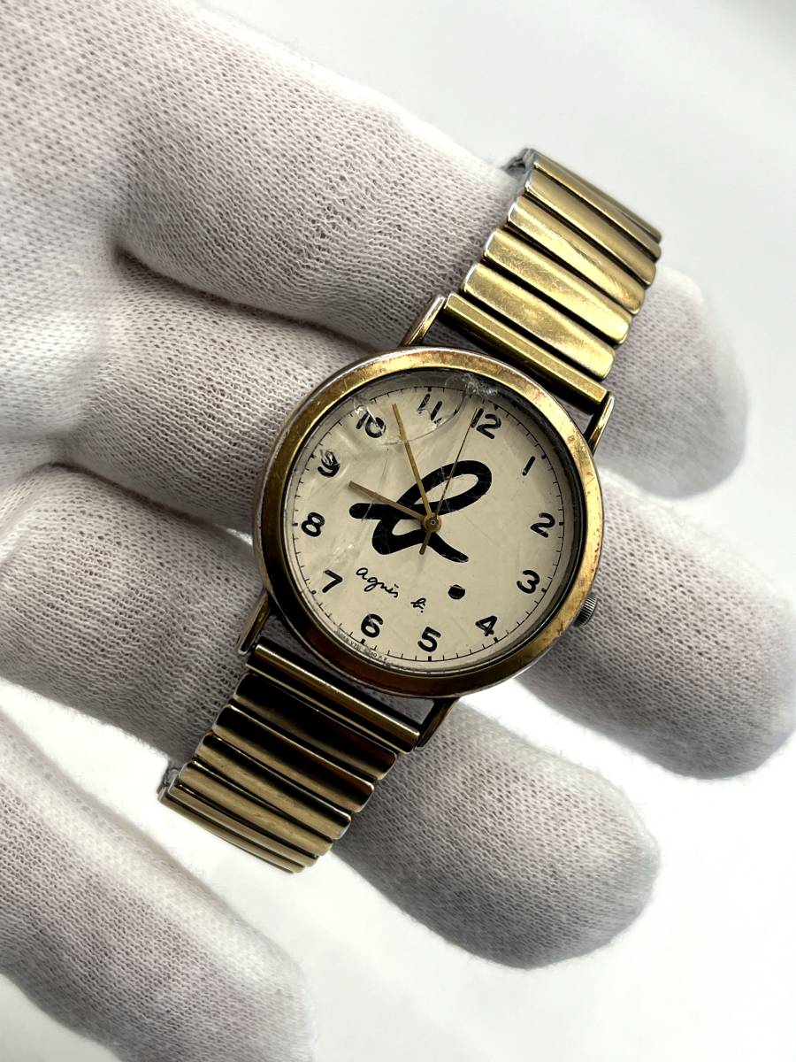 【電池切れ/ガラス割れ】agnes b. アニエスベー クォーツ 腕時計 白文字盤 ラウンド ロゴ柄 スプリング 蛇腹 レディース V701-6200_画像3