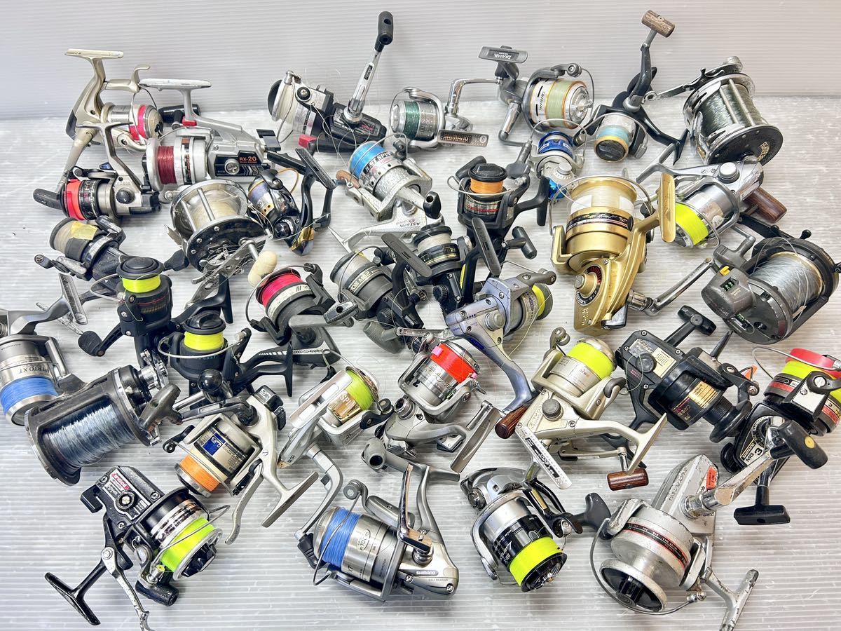 中古フィッシングリール 35点まとめ売り Daiwa/DAIWA/SHIMANO/RYOBI/釣り具/釣具 動作未確認 ジャンク品_画像1