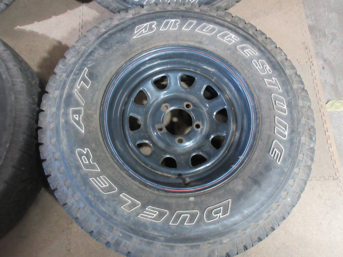 デイトナホイール 黒 赤青 PCD114.3 ブリヂストンタイヤ BRIDGESTONE DUELER A/T 30X9.50R15LT 104S 4本 №07010 室内保管 夏タイヤの画像3