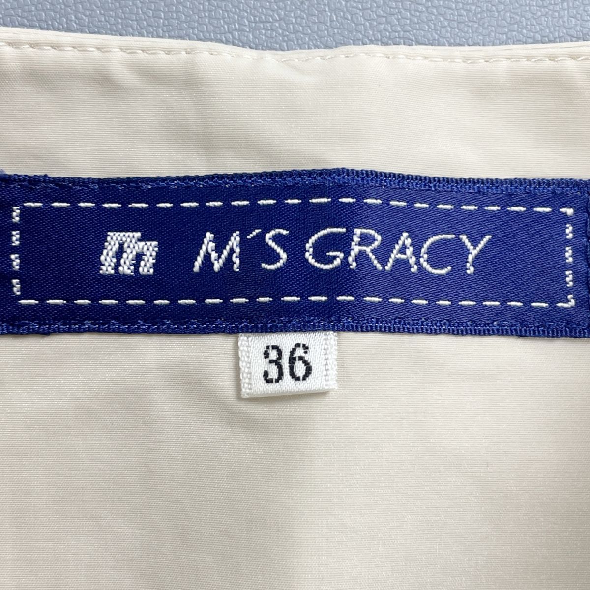 美品 M'S GRACY エムズグレィシー タックフレアスカート 裾チュール サイドジップ 膝丈 裏地あり ベージュ サイズ36*LC1299_画像6